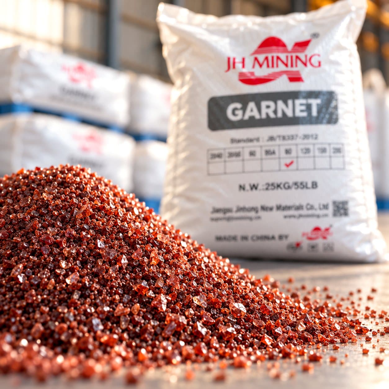 Close-up of red garnet abrasive granules